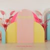 colorful photo-op display of shapes and pink leaves